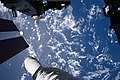 ISS-61 EVA-6 (c) Andrew Morgan photographs the Earth below him.jpg