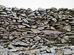 Inside the Celtic Iron Age hillfort of Tre'r Ceiri, Gwynedd Wales, with 150 houses; finest in N Europe 82.jpg