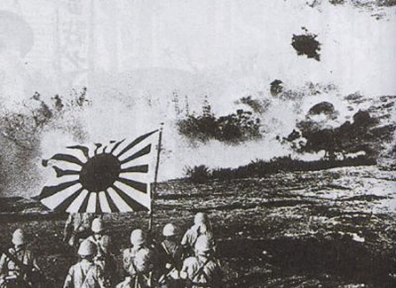 File:Japanese naval landing forces blasting Chinese pillbox and marching with the naval flag, Canton Operation.jpg