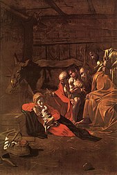 Peinture représentant une étable, dans laquelle sont présents un bœuf, un âne et des bergers qui se prosternent devant une mère et son bébé.