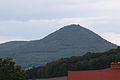 Čeština: Milešovka (837 m) v pohledu z Milešova. České středohoří, Česká republika. English: Milešovka hill (837 m) as seen from Milešov village, České středohoří, Czech Republic.