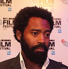 Nicholas Pinnock en el estreno británico The Keeping Room.jpg