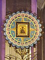 The icon in its mosaic frame, enshrined above the high altar