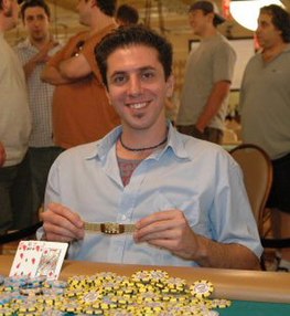 Amit shows his gold WSOP bracelet after he won it in the 2005 World Series of Poker. Rafi Amit 2005 cropped.jpg