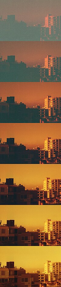 The same scene shot with redscale film at 7 different exposure settings