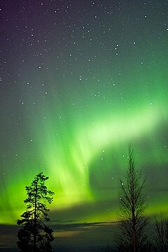 At night, bright aurora borealis are a fairly common sight in the Arctic Circle. The picture of the northern lights in Rovaniemi.