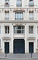 Français : Rue de Château-Landon (Paris). porte cochère et portes piétonnes du numéro 28. E. Nourrigat architecte, 1870.