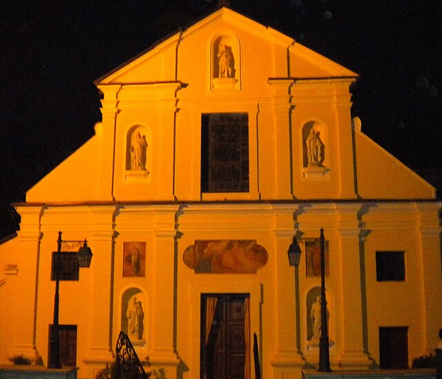 A igreja de San Rocco al Porto à noite.