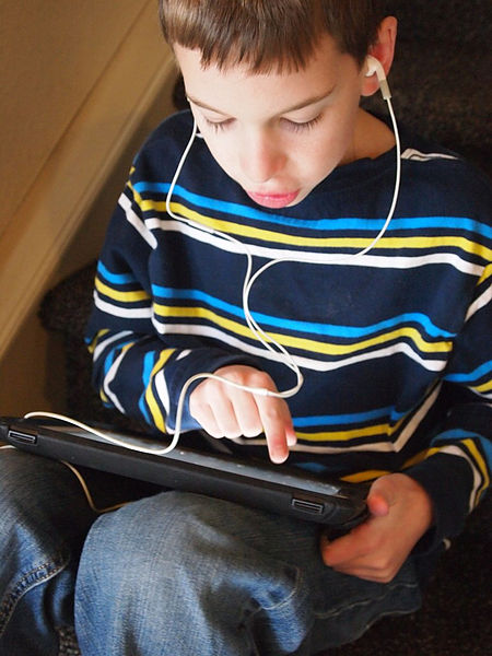 File:School boy with an iPad (6660035203).jpg