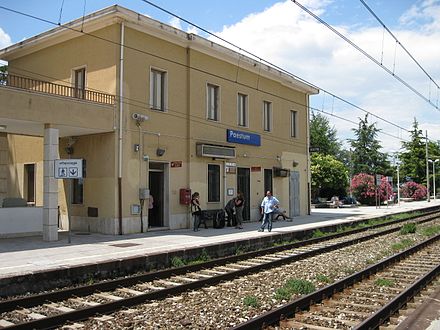 Paestum train station; archaeological site about 10-min walk west through the old city gate.