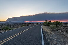 The Black Fire in the Gila National Forest viewed at sunset from NM 51W on 16 May 2022.jpg