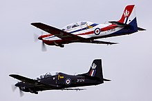 A pair of Tucanos in-flight at the 2012 Royal International Air Tattoo Tucanos - RIAT 2012 (7753923346).jpg