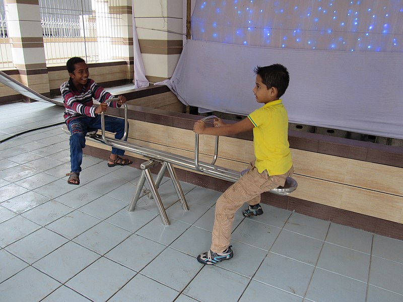 File:Two boys playing in balace 01.jpg