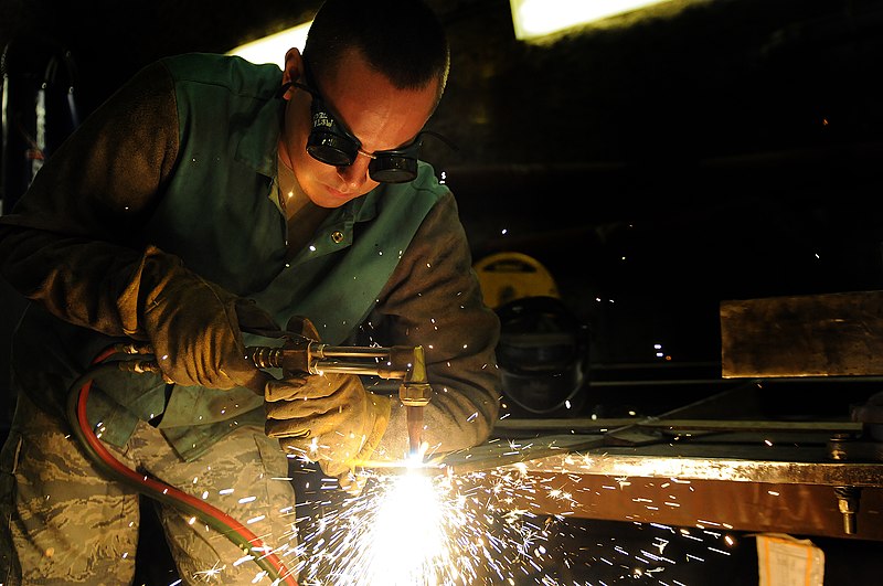 File:U.S. Air Force Airman 1st Class Justin Morris, an aircraft metals technologist with the 379th Expeditionary Maintenance Squadron, works on a piece of aerospace ground equipment May 14, 2013, at an undisclosed 130514-F-FU332-007.jpg