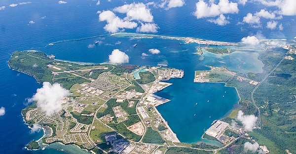 Apra Harbor from the south, with Naval Base Guam on the Orote Peninsula in the foreground