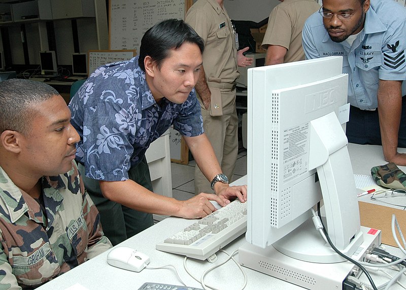 File:US Navy 070712-N-9758L-058 Matt Inaki, computer network defender coach-trainer of SPAWAR Systems Center San Diego, shows how to monitor the activity of a network to Air Force Staff Sgt. Daryl Graham and Information Systems Tech.jpg