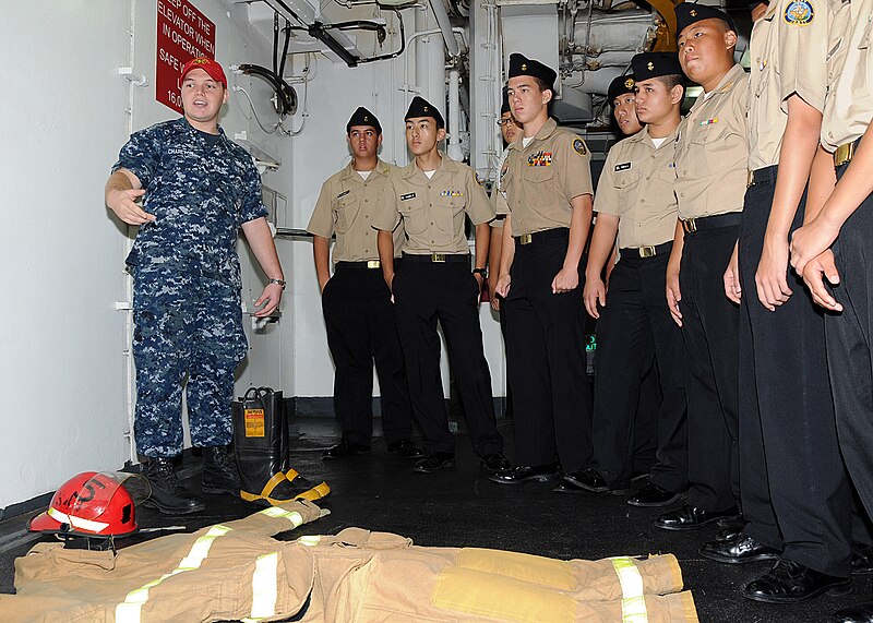 File:US Navy 110923-N-UE250-106 Damage Controlman 3rd Class Daniel Charlton, left, shows Navy Junior ROTC cadets from Father Duenas Memorial School the.jpg