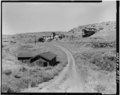 VIEW OF THE SMITH NO. 3 SITE AREA TO THE NORTHWEST. THE MINE OFFICE BUILDING IS IN THE FOREGROUND AND THE TIPPLE AND PROCESSING PLANT ARE IN THE BACKGROUND. - Smith Mine, Bear HAER MONT,5-RELO.V,2-1.tif