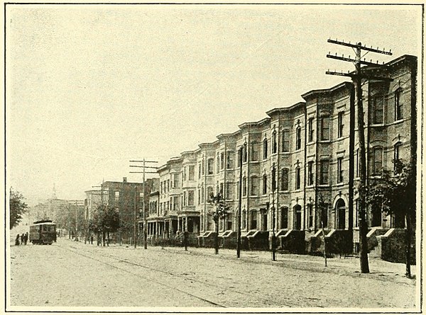 Brownstone houses, now at New York Avenue between Monastery Place and 21st Street