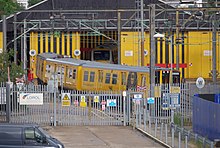 Network Rail's ERTMS test train in the sidings at Willesden TMD Willesden Junction station MMB 55 Willesden TMD 313121 172101.jpg