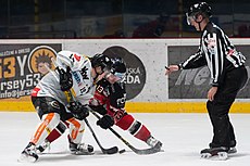 Sylvester taking a faceoff for Dornbirner EC against Colton Yellow Horn on March 6, 2016. 20160306 ZNO vs DEC 8772.jpg