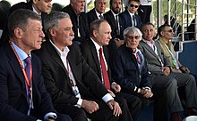 Ecclestone with American executive Chase Carey, and Russian President Vladimir Putin, at the 2017 Russian Grand Prix 2017 Russian Grand Prix 1.jpg