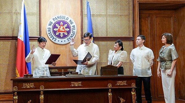 Recto taking the oath as Finance Secretary