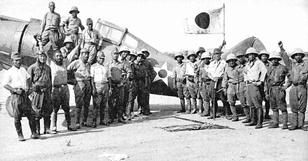 Japanese troops posed with a P-35A of 34th Pursuit Squadron