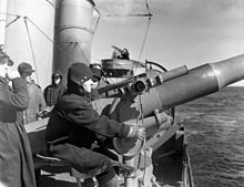 Crew manning a 4-inch gun off Halifax in March 1941 4 inch gun & crew HMCS St Croix 1941 LAC a105295-v6.jpg