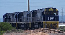 FreightCorp liveried 82 class locomotives at Port Augusta in December 2006 8204 8202 8201 at Port Augusta.JPG