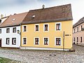 Wohnhaus in geschlossener Bebauung und Ecklage