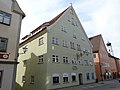 Residential and commercial building;  formerly Gasthaus zum Goldenen Lamm