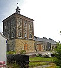 Individual features of the whole Marienschacht: Shaft tower (Malakow tower), hoisting machine house, former boiler house, social building with mooring, boiler house and sandstone loading walls of the former shaft (see also Obj. 08964242, Schachtstrasse 8, 10, 12)