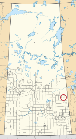 A map of the province of Saskatchewan showing 297 rural municipalities and hundreds of small Indian reserves. One is highlighted with a red circle.