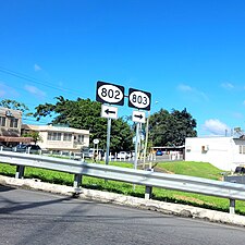 Signs for PR-802 and PR-803 at PR-152 junction in Cedro Arriba, Naranjito