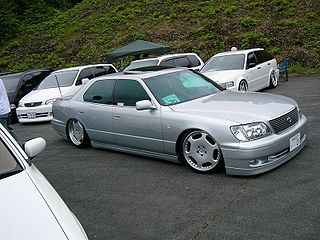 VIP style is a car modification trend that translates from the Romanised Japanese term 'bippu.' It refers to the modification of Japanese luxury automobiles to make them lower and wider in stance, with more aggressive wheels, suspension, and body kits. VIP Style cars are typically large, rear-wheel drive luxury sedans, although automotive enthusiasts sometimes use other cars such as minivans or kei cars.