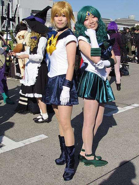 Cosplayers dressed as Sailor Uranus and Sailor Neptune from Sailor Moon
