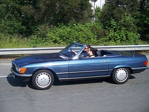 Driving a convertible. Convertible Mercedes Car Driving On A Highway.jpg