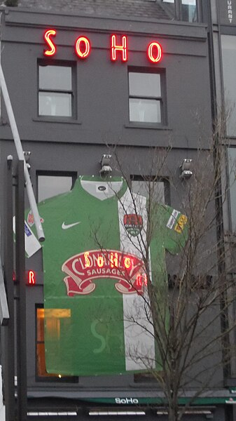 Graphic of a Cork City shirt decorating a bar on Grand Parade