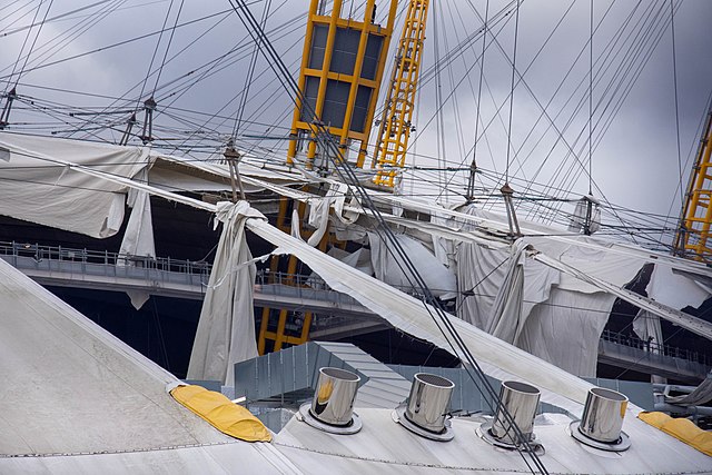 Damage to the O2's tent, above the roof of the O2 Arena, caused by Storm Eunice (2022)