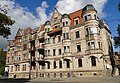 Double apartment building in a corner