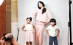 Duma together with her children Cleo (left) and Judeo (right) in 2020. Duma Riris Silalahi With Her Childrens.jpg