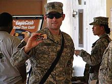 A serviceman with an EagleCash card in May 2007 Eaglecash.jpg