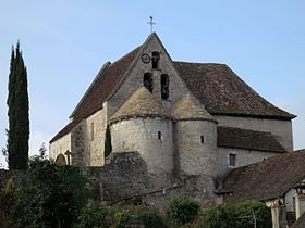 Udsigt over Saint-Germain de Creysse kirken og dens dobbelte apsis.