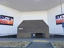Installation by Bruce Nauman with various video performances Entree of the Schaulager museum, Munchenstein, 2018.jpg