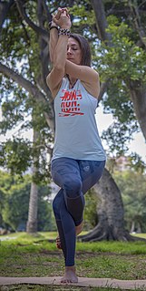 Garudasana Standing balancing posture in modern yoga