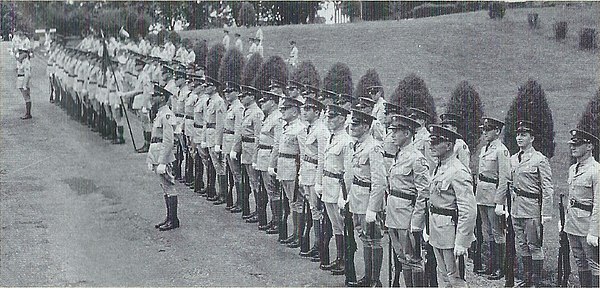 A 1935 honor guard awaits the arrival of the assistant secretary of war