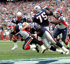 J.P. Losman tackled in the end zone by Ty Warren 2006-09-10.jpg