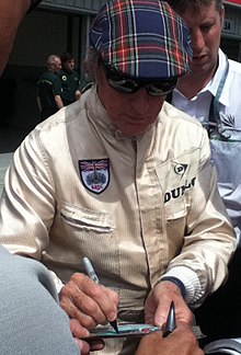 Stewart in the Silverstone pit lane for the 2014 British Grand Prix Jackie Stewart Silverstone 2014.JPG