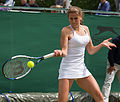 Katy Dunne competing in the first round of the 2015 Wimbledon Qualifying Tournament at the Bank of England Sports Grounds in Roehampton, England. The winners of three rounds of competition qualify for the main draw of Wimbledon the following week.